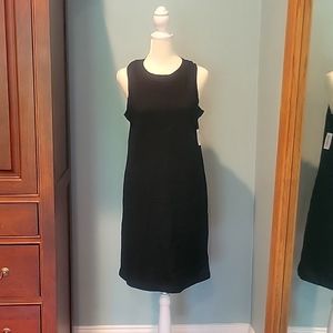 Black sleeveless cotton dress. Size Medium. NWT. Has pockets!